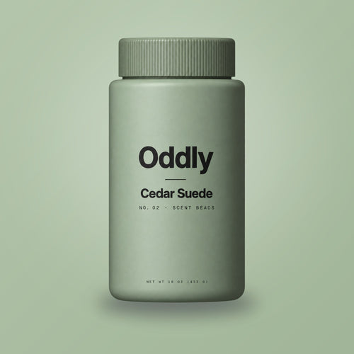 Oddly Cedar Suede scent beads jar on sage green (generated render)