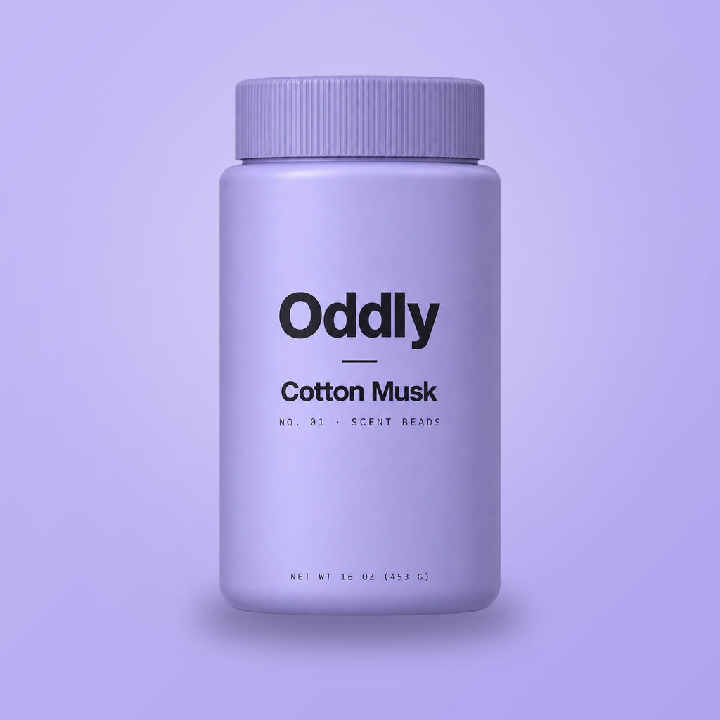 Oddly Cotton Musk scent beads jar on lavender (generated render)