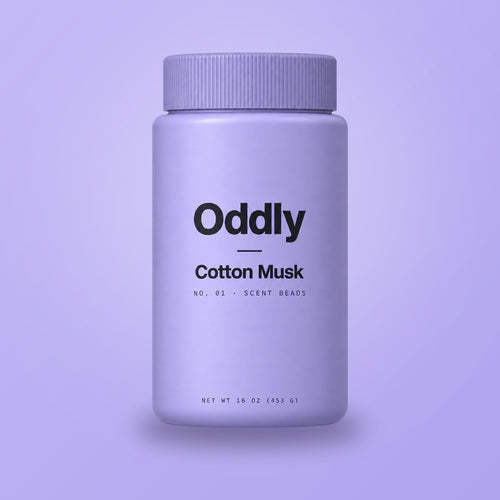 Oddly Cotton Musk scent beads jar on lavender (generated render)