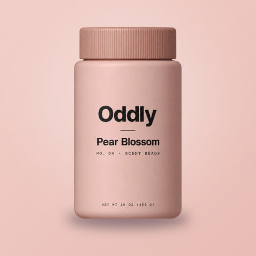 Oddly Pear Blossom scent beads jar on blush pink (generated render)